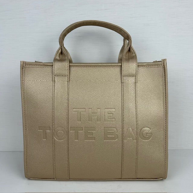 The tote bag goud