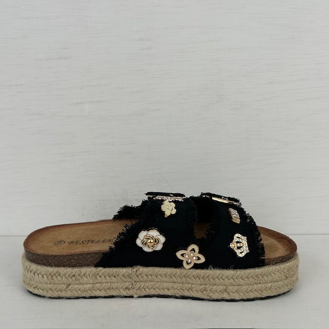 Leuke slippers met gevlochten zool zwart