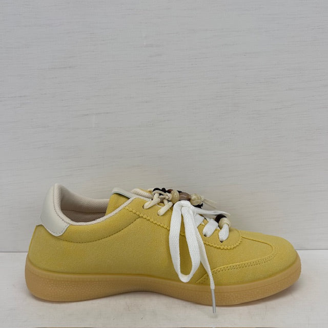 Retro sneakers met gave afwerking geel