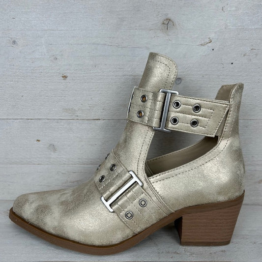 Sierlijk cowboylaarsje met open afwerking goud