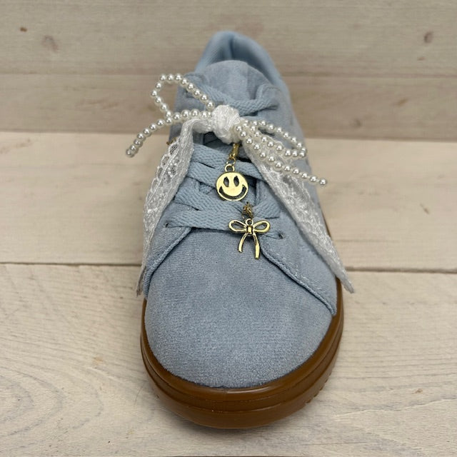 Retro sneaker met sierlijke afwerking blauw