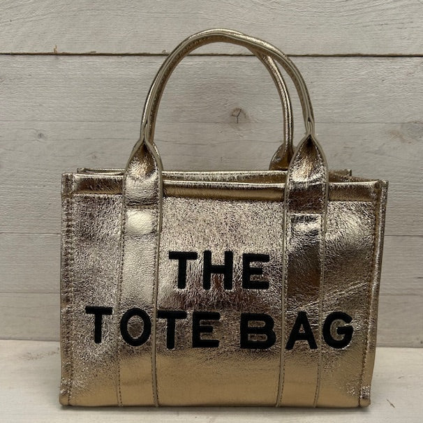 The tote bag klein goud