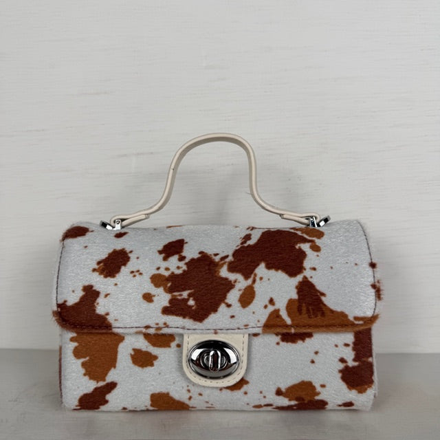 Leuk handtasje met koeienprint en flap