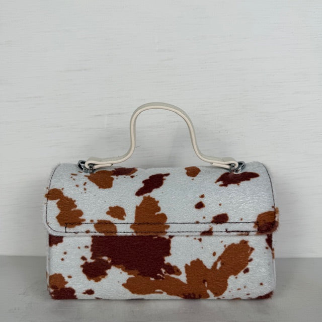 Leuk handtasje met koeienprint en flap