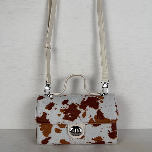 Leuk handtasje met koeienprint en flap