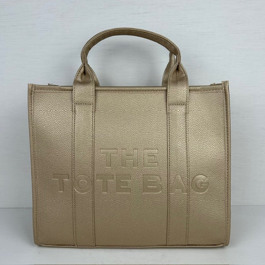 The tote bag goud