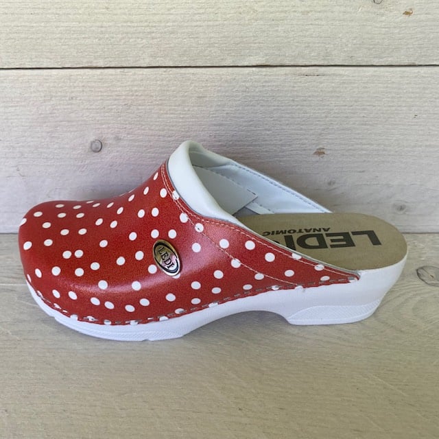 Medische klompen rood dots